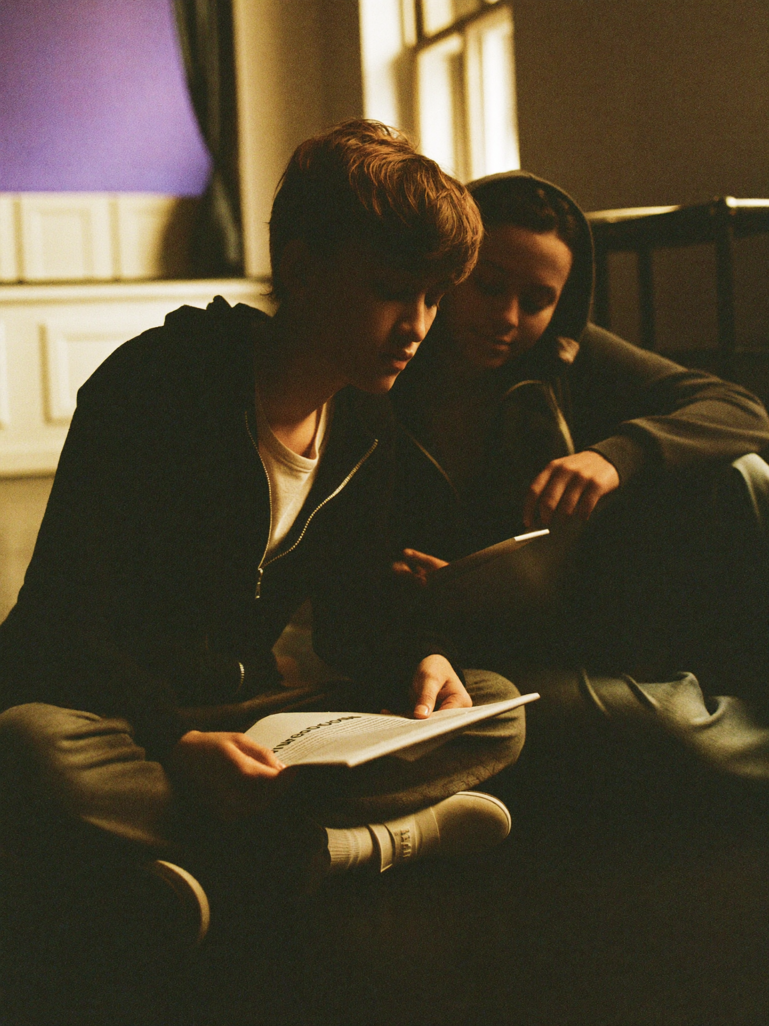 Teens running lines together in rehearsal